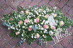 Pink roses country casket spray.